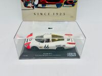 LE MANS: A 1:32 scale slot car by SRC of the Porsche 907 L driven in the 1968 24 Hours of Le Mans together with a metal sign, 40cm long, 30 cm wide [Location: Sydney] - 5