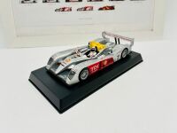 LE MANS: A 1:32 scale slot car by Avant Slot of the Audi R10 TDI together with a framed 'Motor Sport' magazine poster [Location: Sydney] - 2