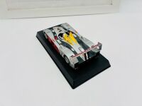 LE MANS: A 1:32 scale slot car by Avant Slot of the Audi R10 TDI together with a framed 'Motor Sport' magazine poster [Location: Sydney] - 3