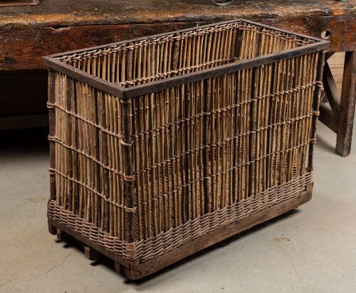 CART: An industrial wicker and iron cart, measures 113cm long, 58cm wide, 84cm high. Possibly used for laundry or wool.