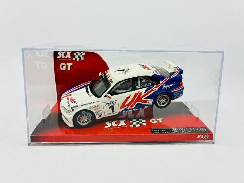 BMW: A 1:32 scale slot car by SCX of the BMW 320i driven by Andy Priaulx in the 2005 WTCC season, unopened box with seals intact [Location: Sydney]