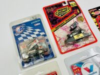 SPRINT CARS: Eight 1:64 scale and one 1:32 scale model sprint cars together with six stickers and three badges [Location: Sydney] - 2