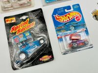 SPRINT CARS: Eight 1:64 scale and one 1:32 scale model sprint cars together with six stickers and three badges [Location: Sydney] - 4