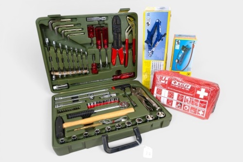 361 · AUTOMOTIVE TOOLS: A group of automotive-related tools, including a tool kit, jumper leads, a jack, a foot tyre pump and a first aid kit, all appear new to be new and of German origin