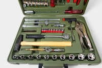 AUTOMOTIVE TOOLS: A group of automotive-related tools, including a tool kit, jumper leads, a jack, a foot tyre pump and a first aid kit, all appear new to be new and of German origin - 2