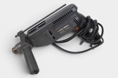 416 · HAMMER DRILL: A Black and Decker model no BD250, 240v, 710W hammer drill