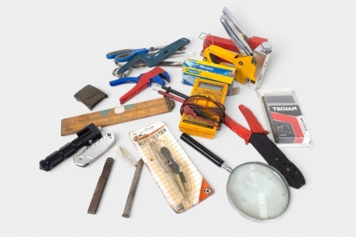 SUNDRIES: A group of various sundries, including hand staple guns, scissors, wire strippers, voltage meter and circuit auto tester