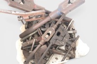TAP & DIE: A tub of various tap and die tools, including wrenches, dies, and thread taps - 2