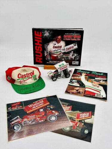 367 · GARRY RUSH: A group of Garry rush items including a signed hat, two signed posters, a 1:24 scale model, two books and two photos [Location: Sydney]