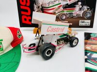 GARRY RUSH: A group of Garry rush items including a signed hat, two signed posters, a 1:24 scale model, two books and two photos [Location: Sydney] - 3