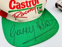 GARRY RUSH: A group of Garry rush items including a signed hat, two signed posters, a 1:24 scale model, two books and two photos [Location: Sydney] - 4