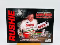 GARRY RUSH: A group of Garry rush items including a signed hat, two signed posters, a 1:24 scale model, two books and two photos [Location: Sydney] - 6