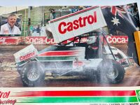 GARRY RUSH: A group of Garry rush items including a signed hat, two signed posters, a 1:24 scale model, two books and two photos [Location: Sydney] - 9
