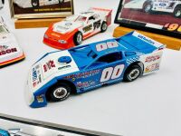 DIRT LATE MODEL: Three 1:24 scale models from the Dirt Late Model series by Action Collectables and ADC together with two framed Clint Smith photos and a novelty licence plate [Location: Sydney] - 2
