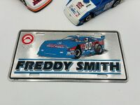 DIRT LATE MODEL: Three 1:24 scale models from the Dirt Late Model series by Action Collectables and ADC together with two framed Clint Smith photos and a novelty licence plate [Location: Sydney] - 10