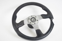 MOMO: A Momo three spoke leather rimmed steering wheel with boss, marked at rear 'TYP 035 - KBA 70116 - 06-96', 35cm wide