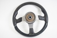 MOMO: A Momo three spoke leather rimmed steering wheel with boss, marked at rear 'TYP 035 - KBA 70116 - 06-96', 35cm wide - 2