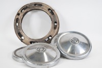 WHEEL CAPS: A set of British Leyland domed wheel caps, 23cm wide