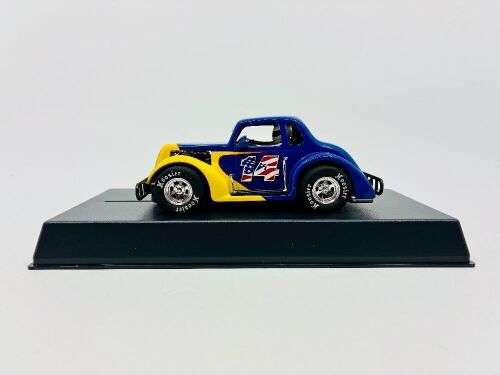 379 · SLOT CAR: A 1:30 scale slot car by Pioneer of a 1937 Dodge Coupe with original packaging [Location: Sydney]