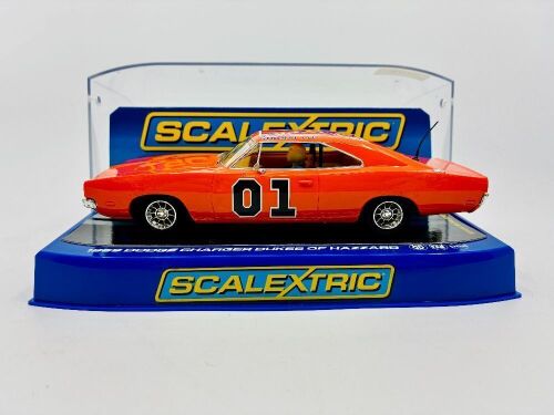 DUKES OF HAZZARD: A 1:32 scale slot car by Scalextric of the 1969 Dodge Charger 'General Lee' from the Dukes of Hazzard with original display case [Location: Sydney]