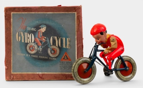 GYRO CYCLE: A fine & rare circa 1930s Tri-ang (England) Gyro Cycle mechanical wind up toy, features moving rider on bicycle, in original box, 20cm long