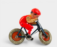 GYRO CYCLE: A fine & rare circa 1930s Tri-ang (England) Gyro Cycle mechanical wind up toy, features moving rider on bicycle, in original box, 20cm long - 2