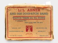 L'IL ABNER DOGPATCH BAND: A circa 1945 Unique Art Manufacturing Co (USA) clockwork tinplate 'L'il Abner & his Dogpatch Band' set in original box, features four moving figures attached to piano, 16.5cm wide, 14cm high - 6