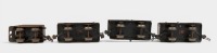 TIN TOY TRAINS: A circa 1930s or 1940s German tinplate train set, includes two passenger cars, one freight car & one coal tender, overall length 56cm - 3