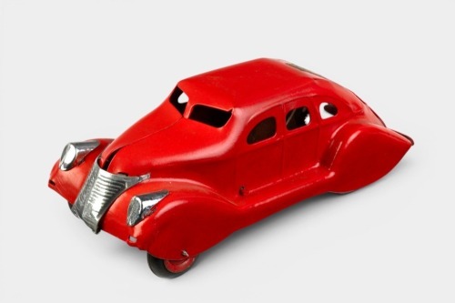 MYSTERY CAR: A fine circa 1930s Louis Marx & Company (USA) tinplate clockwork (push down - no key) 'Mystery Car' in Lincoln Zephyr style, 24cm long