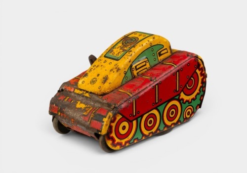 TOY TANK: A circa 1950s Louis Marx & Co. (USA) tinplate clockwork 'number 5' rollover tank toy, 10cm long