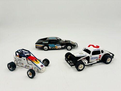 394 · SPEEDWAY: Three 1:24 scale models by Action Collectables, ERTL and ADC featuring a dirt modified model, a midget series model and a vintage modified model [Location: Sydney]