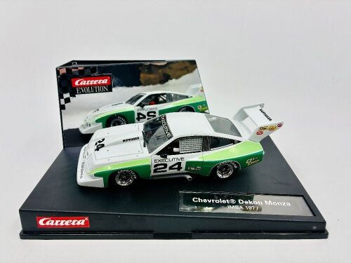 CHEVROLET DEKON MONZA: A 1:32 scale slot car by Carrera of the Chevrolet Dekon Monza driven in the 1977 IMSA series with original display case.