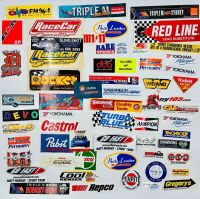 AUTOMOTIVE STICKERS: A large group of stickers, mostly automotive [Location: Sydney]