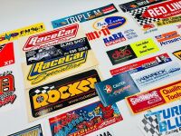 AUTOMOTIVE STICKERS: A large group of stickers, mostly automotive [Location: Sydney] - 2