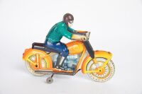 MOTORCYCLE: A c1950s Russian made clockwork tin toy motorcycle with rider, 21cm long