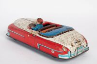 MODERN TOYS: A c1950-60s Modern Toys (Japan) tinplate open top car with driver, 23cm long - 3