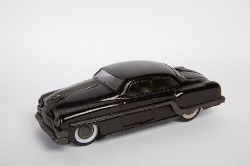 MINISTER DELUXE: A c1950s Minister Deluxe, made by Amar (India) tinplate friction Pontiac Chieftain, 25cm long