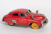 FRICTION CAR: A c1950s Japanese made tinplate friction US style car, 20cm long