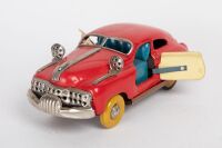 FRICTION CAR: A c1950s Japanese made tinplate friction US style car, 20cm long - 5