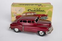 SSS: A c1950s-1960s SSS (Japan) tinplate friction New Cadillac, 16cm long