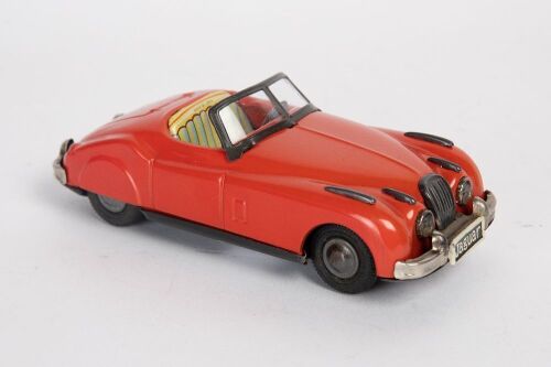 JAGUAR: A c1950s Japanese made tinplate friction Jaguar XK120, 15cm long