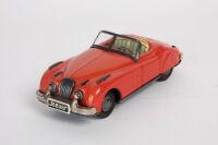 JAGUAR: A c1950s Japanese made tinplate friction Jaguar XK120, 15cm long - 2