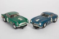 SLOT CARS: Two slot cars, includes an Aston Martin and a Mercedes 300SL, both 14cm long