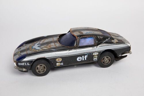 FERRARI: A c1970s SKK (Korea) battery operated tinplate rally Ferrari 250 GTO, 23cm long