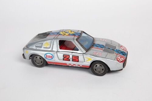 MERCEDES: A c1960s or 1970s Yone (Japan) tinplate friction Mercedes-Benz C-111 race car, 18cm long