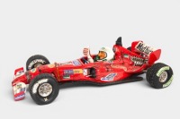 GUILLERMO FORCHINO: A polyresin comic art style Formula One car by Guillermo Forchino, limited edition (3750/5000), 47cm long