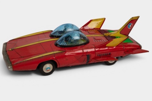 CRAGSTAN: A c1965 Cragstan (USA) tinplate battery Pontiac Firebird II concept car toy, 29cm long