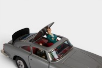 ASTON MARTIN: A c1960s United (Japan) tinplate friction Multi Action 711 Aston Martin Secret Ejector car toy (#51262), 28cm long, in original box - 4