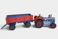 TRACTOR: A c1950s Gama (US Zone Germany) tinplate battery operated tractor & trailer toy, 40cm long