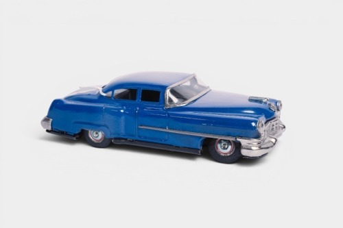 CADILLAC: A c1950s TN Nomura (Japan) tinplate battery operated Cadillac hardtop, 21cm long